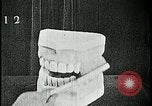 Image of brushing teeth Kansas City Missouri USA, 1922, second 29 stock footage video 65675078316
