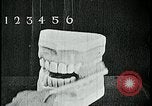 Image of brushing teeth Kansas City Missouri USA, 1922, second 32 stock footage video 65675078316