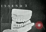 Image of brushing teeth Kansas City Missouri USA, 1922, second 33 stock footage video 65675078316