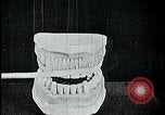 Image of brushing teeth Kansas City Missouri USA, 1922, second 36 stock footage video 65675078316