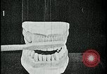Image of brushing teeth Kansas City Missouri USA, 1922, second 37 stock footage video 65675078316