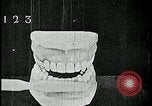 Image of brushing teeth Kansas City Missouri USA, 1922, second 38 stock footage video 65675078316