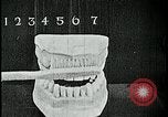 Image of brushing teeth Kansas City Missouri USA, 1922, second 40 stock footage video 65675078316