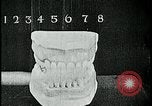 Image of brushing teeth Kansas City Missouri USA, 1922, second 41 stock footage video 65675078316