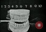 Image of brushing teeth Kansas City Missouri USA, 1922, second 42 stock footage video 65675078316