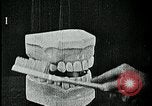 Image of brushing teeth Kansas City Missouri USA, 1922, second 44 stock footage video 65675078316