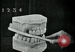 Image of brushing teeth Kansas City Missouri USA, 1922, second 46 stock footage video 65675078316