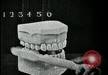 Image of brushing teeth Kansas City Missouri USA, 1922, second 47 stock footage video 65675078316