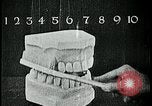 Image of brushing teeth Kansas City Missouri USA, 1922, second 49 stock footage video 65675078316