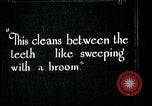Image of brushing teeth Kansas City Missouri USA, 1922, second 57 stock footage video 65675078316