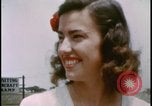 Image of women watching United States USA, 1943, second 32 stock footage video 65675078328