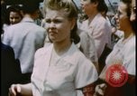 Image of women watching United States USA, 1943, second 55 stock footage video 65675078328