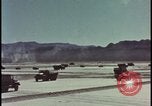 Image of atom bomb blast test destroying vehicles Nevada United States USA, 1955, second 4 stock footage video 65675078365