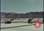 Image of atom bomb blast test destroying vehicles Nevada United States USA, 1955, second 5 stock footage video 65675078365