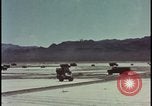Image of atom bomb blast test destroying vehicles Nevada United States USA, 1955, second 7 stock footage video 65675078365