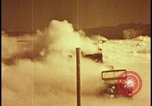 Image of atom bomb blast test destroying vehicles Nevada United States USA, 1955, second 12 stock footage video 65675078365