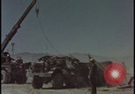 Image of atom bomb blast test destroying vehicles Nevada United States USA, 1955, second 17 stock footage video 65675078365