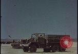 Image of atom bomb blast test destroying vehicles Nevada United States USA, 1955, second 22 stock footage video 65675078365