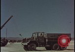Image of atom bomb blast test destroying vehicles Nevada United States USA, 1955, second 23 stock footage video 65675078365