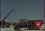 Image of atom bomb blast test destroying vehicles Nevada United States USA, 1955, second 24 stock footage video 65675078365