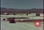 Image of atom bomb hitting oil barrels Nevada United States USA, 1955, second 8 stock footage video 65675078369