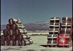 Image of atom bomb hitting oil barrels Nevada United States USA, 1955, second 10 stock footage video 65675078369