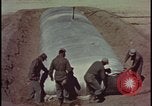 Image of atom bomb hitting oil barrels Nevada United States USA, 1955, second 12 stock footage video 65675078369