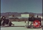 Image of atom bomb hitting oil barrels Nevada United States USA, 1955, second 16 stock footage video 65675078369