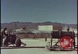 Image of atom bomb hitting oil barrels Nevada United States USA, 1955, second 17 stock footage video 65675078369