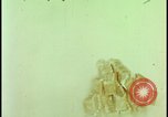Image of atom bomb hitting oil barrels Nevada United States USA, 1955, second 22 stock footage video 65675078369