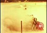 Image of atom bomb hitting oil barrels Nevada United States USA, 1955, second 25 stock footage video 65675078369