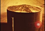 Image of atom bomb hitting oil barrels Nevada United States USA, 1955, second 29 stock footage video 65675078369