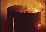 Image of atom bomb hitting oil barrels Nevada United States USA, 1955, second 30 stock footage video 65675078369