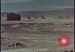 Image of atom bomb hitting oil barrels Nevada United States USA, 1955, second 41 stock footage video 65675078369