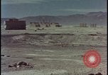 Image of atom bomb hitting oil barrels Nevada United States USA, 1955, second 42 stock footage video 65675078369