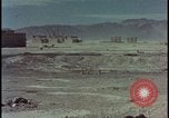 Image of atom bomb hitting oil barrels Nevada United States USA, 1955, second 43 stock footage video 65675078369