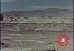 Image of atom bomb hitting oil barrels Nevada United States USA, 1955, second 44 stock footage video 65675078369