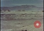 Image of atom bomb hitting oil barrels Nevada United States USA, 1955, second 45 stock footage video 65675078369