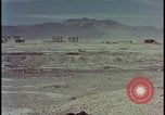 Image of atom bomb hitting oil barrels Nevada United States USA, 1955, second 46 stock footage video 65675078369