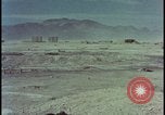 Image of atom bomb hitting oil barrels Nevada United States USA, 1955, second 47 stock footage video 65675078369