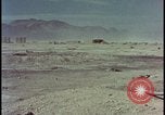 Image of atom bomb hitting oil barrels Nevada United States USA, 1955, second 49 stock footage video 65675078369