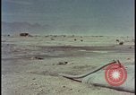Image of atom bomb hitting oil barrels Nevada United States USA, 1955, second 53 stock footage video 65675078369