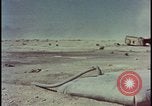 Image of atom bomb hitting oil barrels Nevada United States USA, 1955, second 55 stock footage video 65675078369