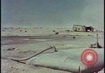 Image of atom bomb hitting oil barrels Nevada United States USA, 1955, second 56 stock footage video 65675078369