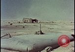 Image of atom bomb hitting oil barrels Nevada United States USA, 1955, second 59 stock footage video 65675078369