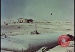 Image of atom bomb hitting oil barrels Nevada United States USA, 1955, second 61 stock footage video 65675078369