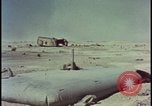 Image of atom bomb hitting oil barrels Nevada United States USA, 1955, second 62 stock footage video 65675078369