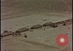 Image of army camp destroyed by atomic bomb blast test Nevada United States USA, 1955, second 1 stock footage video 65675078370
