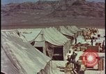 Image of army camp destroyed by atomic bomb blast test Nevada United States USA, 1955, second 6 stock footage video 65675078370