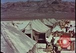 Image of army camp destroyed by atomic bomb blast test Nevada United States USA, 1955, second 7 stock footage video 65675078370